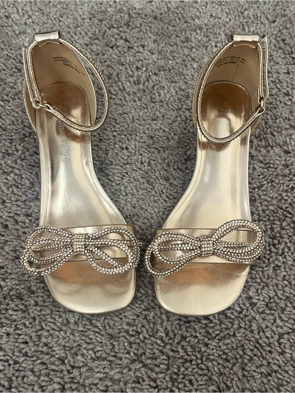 Elegant Kids’ Gold Metallic Ankle-Strap Sandals with Crystal Bow